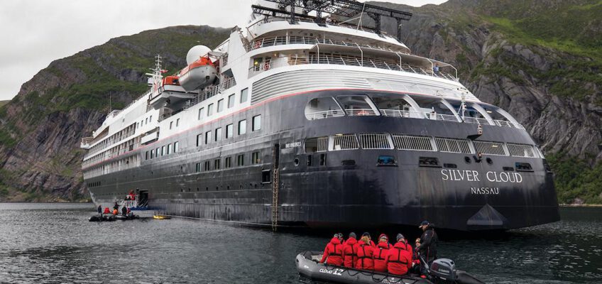 Silver Cloud and zodiacs in the Svalbard.
